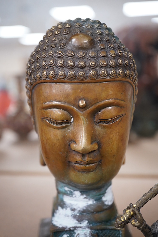 A large Buddhist head seal and seated figure of Tara, largest 19cm high. Condition - fair